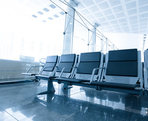 Fototapeta premium contemporary blue lounge with seats in the airport