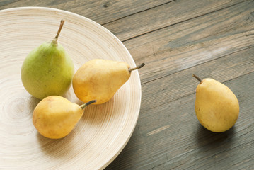 pears on wooden table