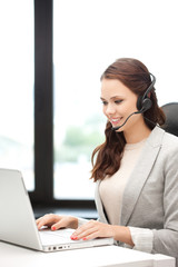 helpline operator with laptop computer