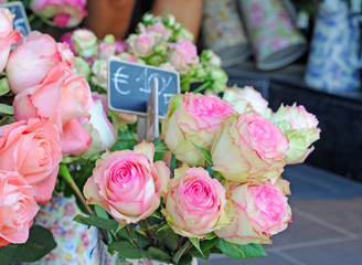 Pink roses on the market place, shallow dof