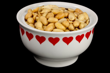 Peanuts in a heart bowl