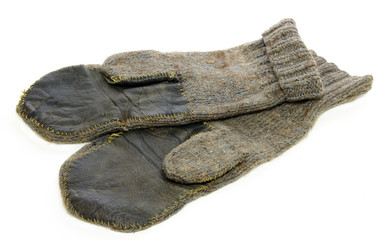 old woolen mittens isolated on white background