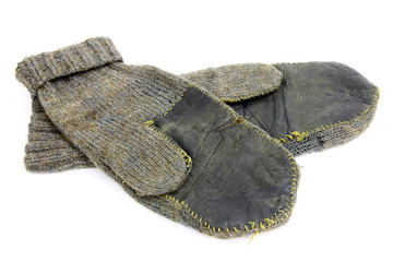 old woolen mittens isolated on white background