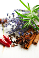 Assorted spices, rosemary and lavender flowers