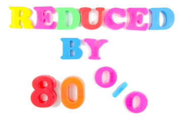 reduced by 80% written in fridge magnetsy