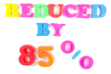 reduced by 85% written in fridge magnets