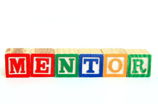 Mentor in alphabet blocks
