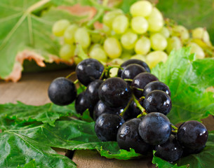 Assortment of grapes on a rustic wooden table