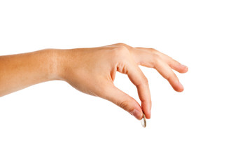 Female hand holding an euro coin