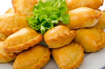 Patties stuffed with meat in the plate