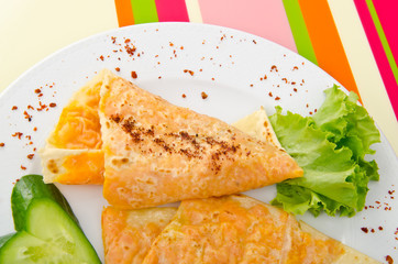 Pumpkin stuffed panckes in the plate