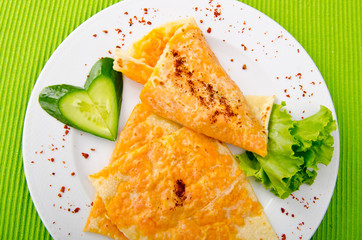 Pancake with pumpkin in plate