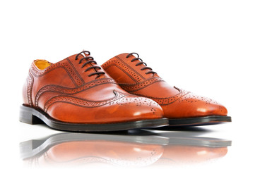 Fashion concept with male shoes on white