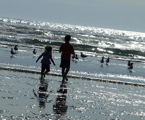 Two Kids Playing on the Beach