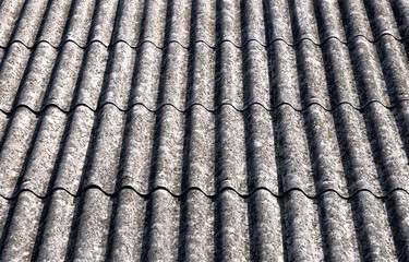 close up on corrugated asbestos roof on byre building in Poland