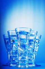 Water in the glass against gradient background