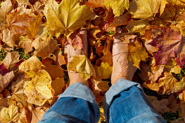 Barfoot on autmn leaves