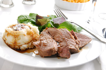 Sliced roast beef dinner