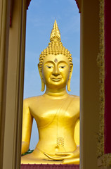 Large golden Buddha. In a temple in Thailand.