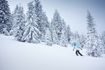 Hiker in winter mountains