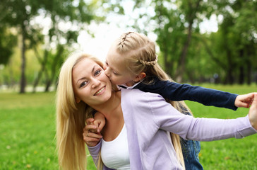 Fototapeta premium Mother and daughter in park