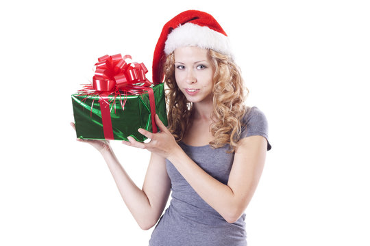 Pretty Santa girl with a present gift for New Year or Christmas