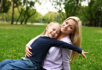 Mother and daughter in park