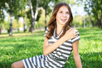 Young woman in summer park