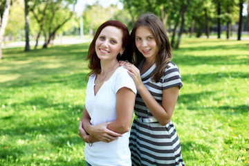 Naklejka premium Mother with her daughter in summer park