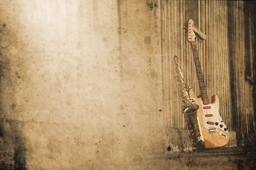 Naklejka na ściany i meble Stary grungy sax z elektryczną gitarą w stylu retro