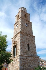 Fototapeta na wymiar Emborio wieża zegarowa, Halki island, Grecja