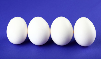 Eggs isolated on purple background
