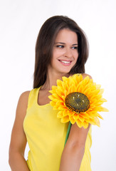 portrait of a beautiful female with a sunflower