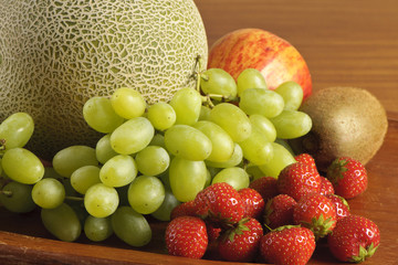 melon, grapes, strawberry and kiwi
