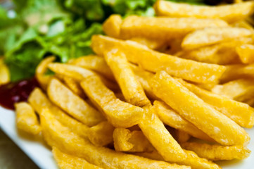 Golden French fries potatoes
