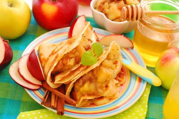 pancakes with stewed apples ,raisins and honey
