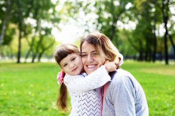 Fototapeta premium Mother and daughter in park