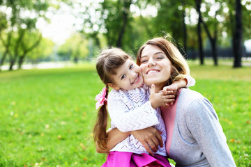 Mother and daughter in park