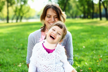 Mother and daughter in park