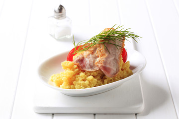 Pan fried chicken with couscous