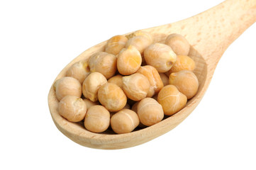 peas in a wooden spoon