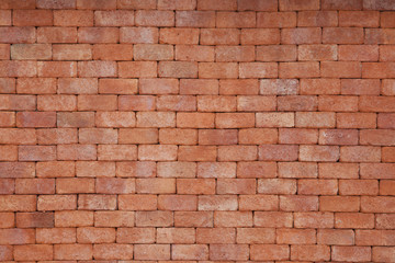 Weathered stained old brick wall background