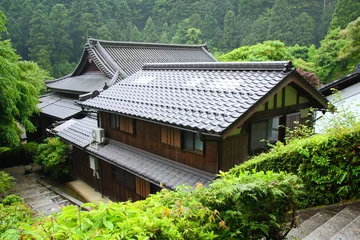 Tuinposter Traditional japanese house in the mountains near Kyoto © rudiuk