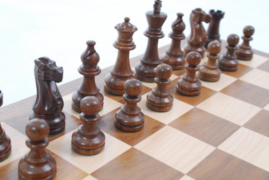chess pieces on white