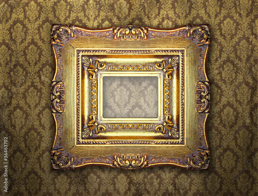 Wall mural ornamental gold frame on an aged damask wallpaper