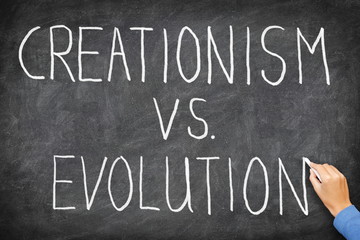 Fototapeta premium Creationism vs. Evolution