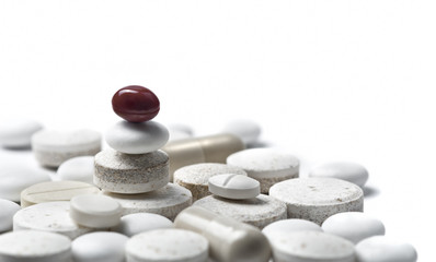 Fototapeta na wymiar zen style pills isolated on white