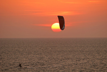 kitesurfer at sunset