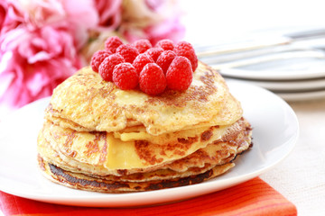 Pancakes with fresh raspberries