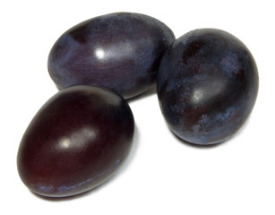 Plums isolated on white